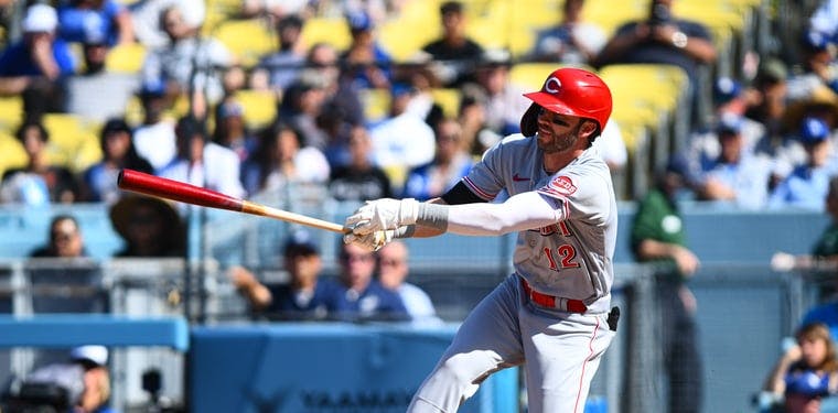 Reds right fielder Tyler Naquin hits a single against the Los Angeles Dodgers