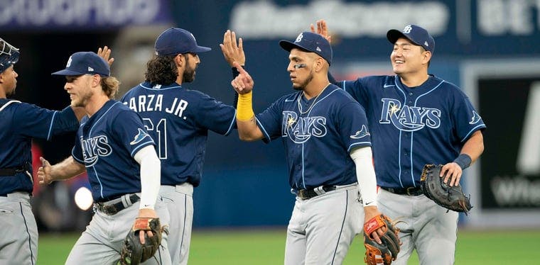 The Tampa Bay Rays celebrate a win over the Toronto Blue Jays