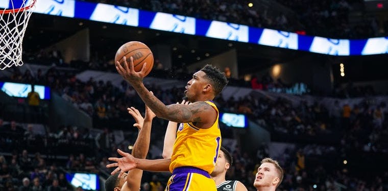 Lakers guard Malik Monk shoots the ball in the second half against the Spurs