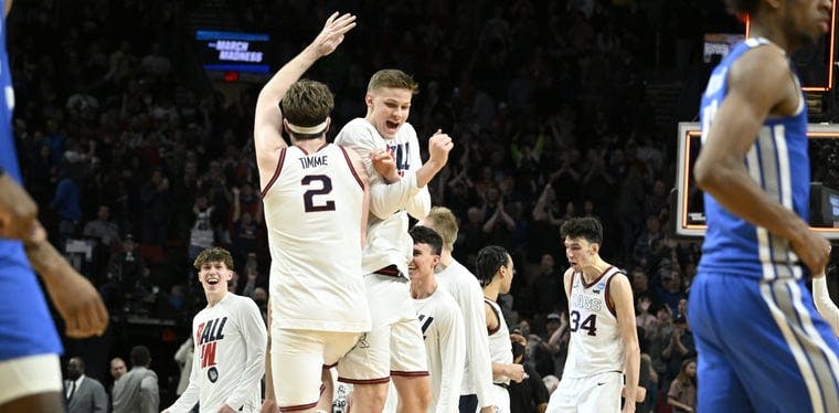 Gonzaga Bulldogs forward Drew Timme (2) and team mates celebrate their Round of 32 win over Memphis in the Mode Center in Portland, Oregon.