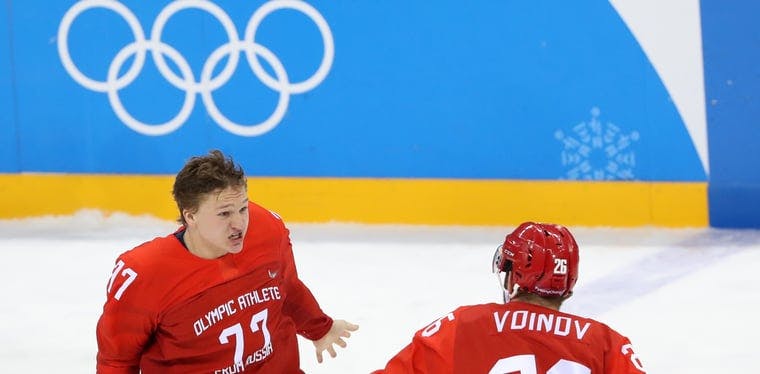 Kirill Kaprizov (77) celebrates after netting the Russian Olympic Committee's gold medal winning goal in overtime of the XXIII Olympic Winter Games
