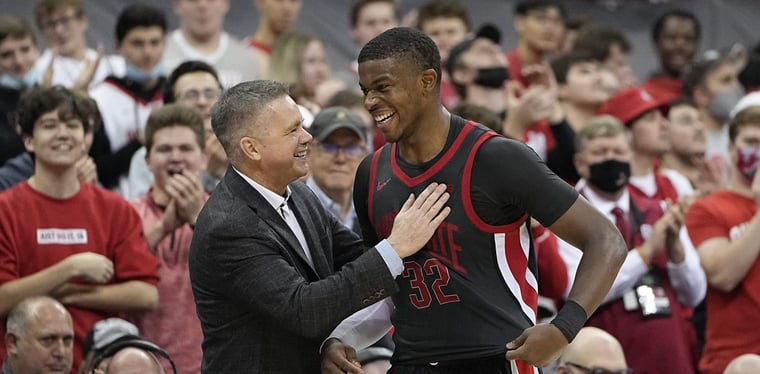 EJ Liddell and Coach Chris Holtmann celebrate a home win earlier in the season at Value City Arena