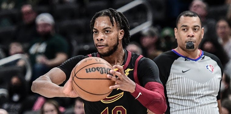 Darius Garland throws puts the ball in play against the Milwaukee Bucks on December 18, 2021 