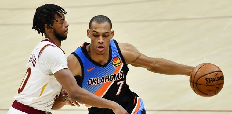 Oklahoma City Thunder forward Darius Bazley (7) drives to the basket against Cleveland Cavaliers guard Darius Garland (10) during the third quarter at Rocket Mortgage FieldHouse.