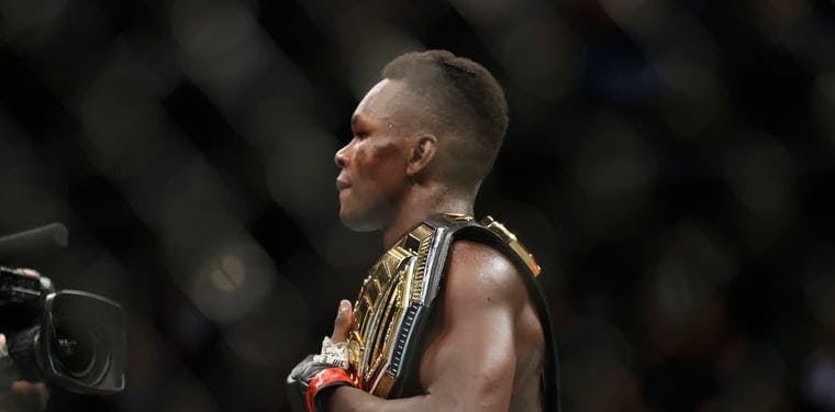 Israel Adesanya reacts after the fight against Robert Whittaker during UFC 271 at Toyota Center