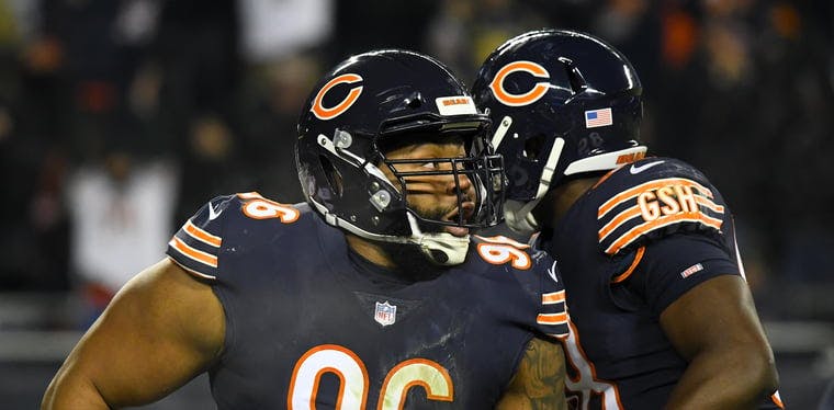 Free agent defensive tackle Akiem Hicks celebrates with the Chicago Bears