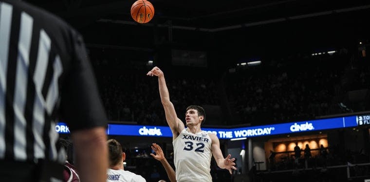 Xavier's Zach Freemantle shoots a basket during game against Montana