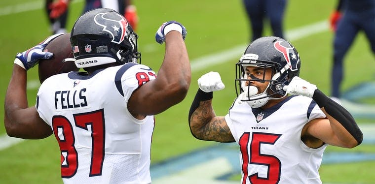 Texans tight end Darren Fells celebrates with wide receiver Will Fuller after scoring
