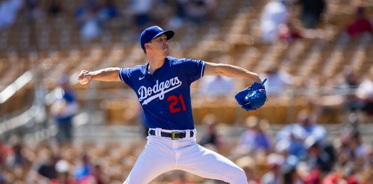  Los Angeles Dodgers pitcher Walker Buehler delivers a pitch against the Cincinnati Reds at Camelback Ranch-Glendale during an MLB Spring Training contest.