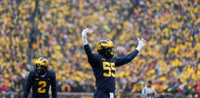 Michigan linebacker David Ojabo cheers the crowd before a play against Ohio State