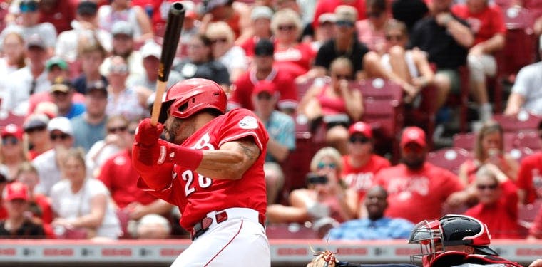 Reds left fielder Tommy Pham records a hit against the St. Louis Cardinals