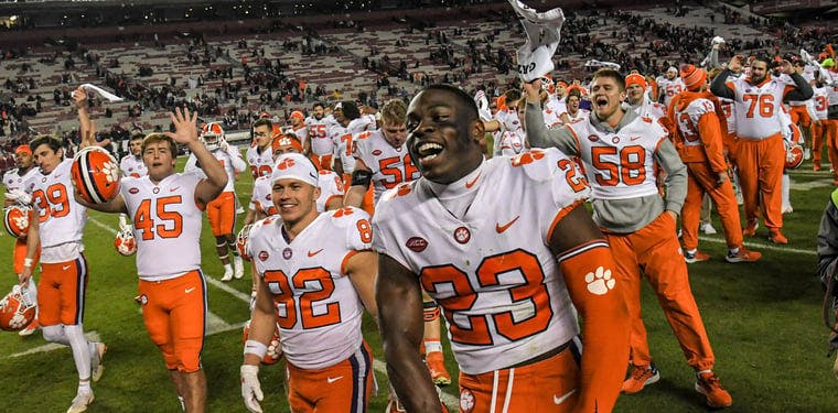 Clemson cornerback Andrew Booth Jr. celebrates with teammates after a victory