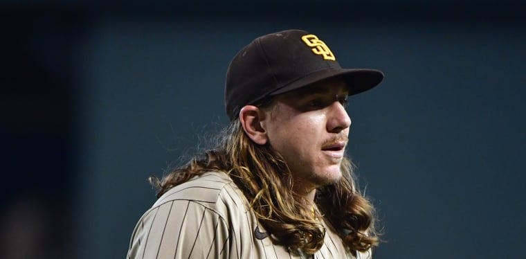 Padres starting pitcher Mike Clevinger looks on in the second inning