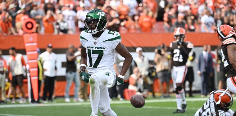 Jets wide receiver Garrett Wilson celebrates after catching a touchdown against the Browns