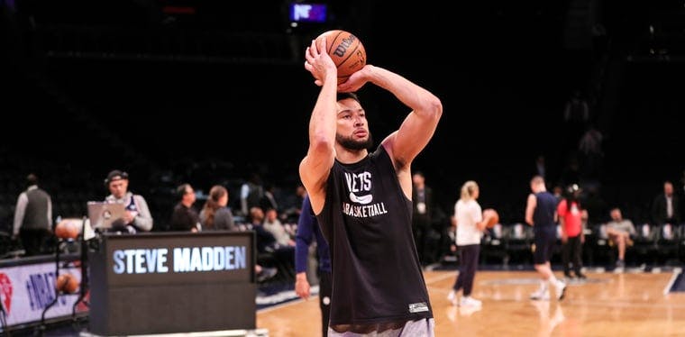 Brooklyn Nets guard Ben Simmons takes a shot during warmups