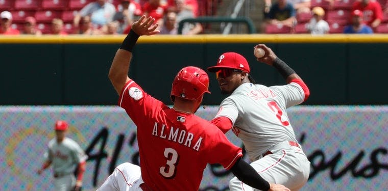 Reds outfielder Albert Almora Jr. is forced out by Phillies second baseman Jean Segura
