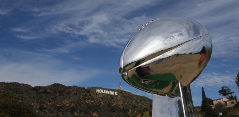 The Vince Lombardi trophy with the Hollywood sign in the background.