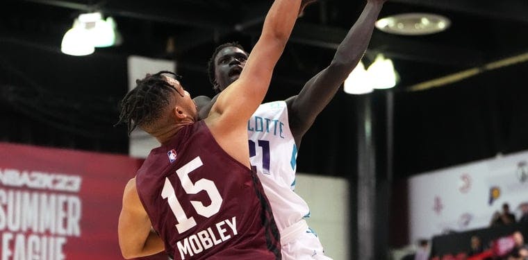 Hornets forward JT Thor shoots against Cleveland Cavaliers forward Isaiah Mobley