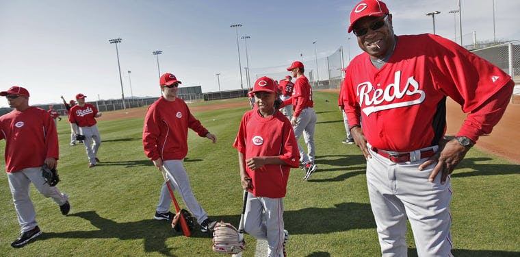 Who's that new kid? Darren Baker, now 13, was the center of attention for a few moments as the team took the field. The Cincinnati Reds pitcher and catchers on Day two of Spring Training.
