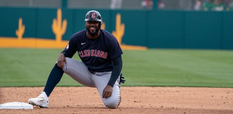 Guardians designated hitter Franmil Reyes smiles after reaching second base