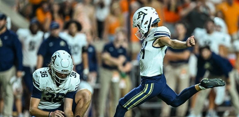 Akron ZIps kicker Noah Perez attemps a kick against the Tennessee Volunteers