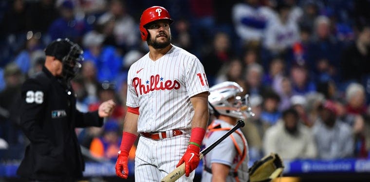 Phillies outfielder Kyle Schwarber looks into the distance against the Mets