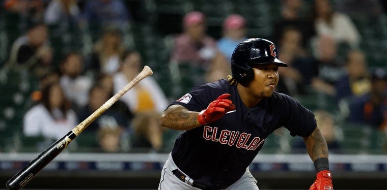 Guardians designated hitter Jose Ramirez hits a single in the eighth inning against the Detroit Tigers
