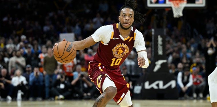 Cleveland Cavaliers guard Darius Garland (10) brings the ball up court in the fourth quarter against the Philadelphia 76ers.
