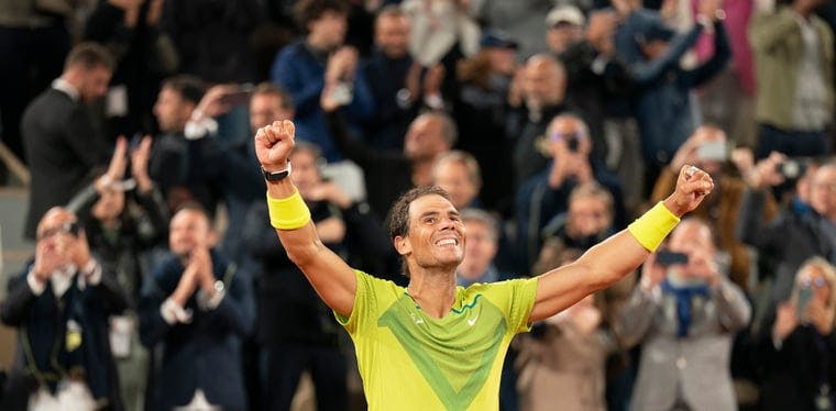 Rafael Nadal celebrates winning his match in four sets against Novak Djokovic