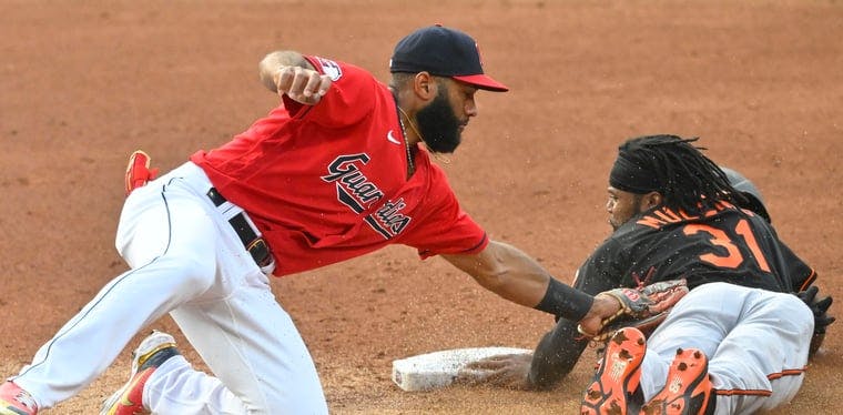 Orioles outfielder Cedric Mullins steals second a ahead vs. Guardians shortstop Amed Rosario