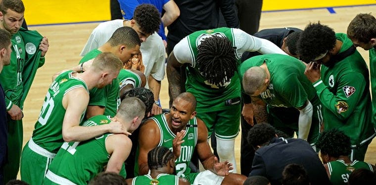 Al Horford talks to his team against the Golden State Warriors