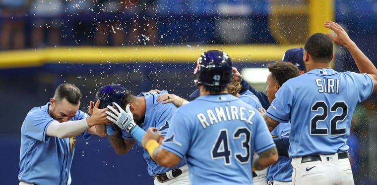 The Tampa Bay Rays celebrate a walkoff victory against the Los Angeles Angels