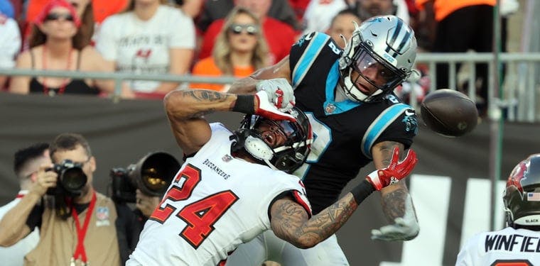 Carlton Davis III (24) breaks up a pass intended for Panthers Wide Receiver DJ Moore (2).