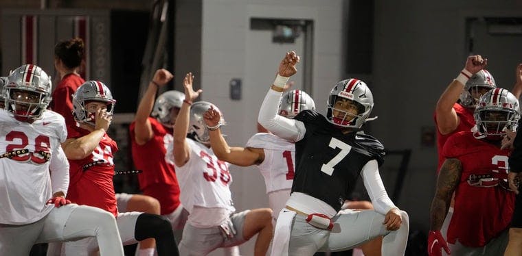 Buckeyes quarterback C.J. Stroud stretches during a spring football practice