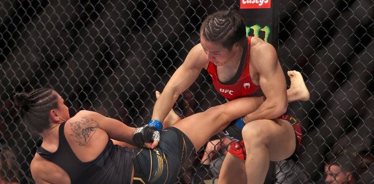 Carla Esparza and Zhang Weili fight during UFC 281