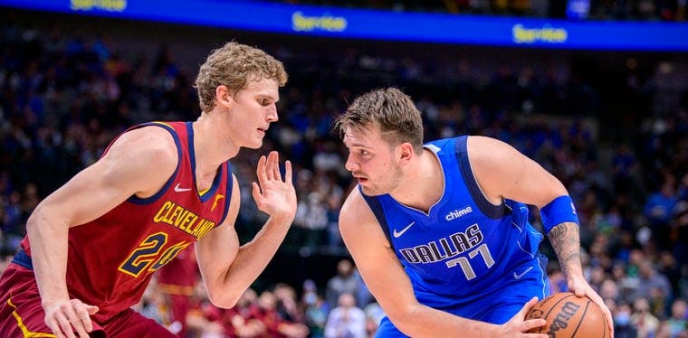  Cleveland Cavaliers forward Lauri Markkanen (24) guards Luka Doncic of the Dallas Mavericks (77) in an earlier game against pitting the two teams against each other in Dallas. They rematch tonight at the Fieldhouse.