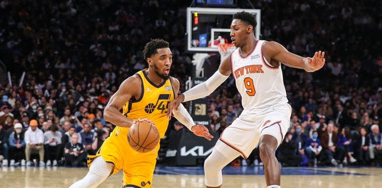 Jazz guard Donovan Mitchell drives the basketball against the New York Knicks