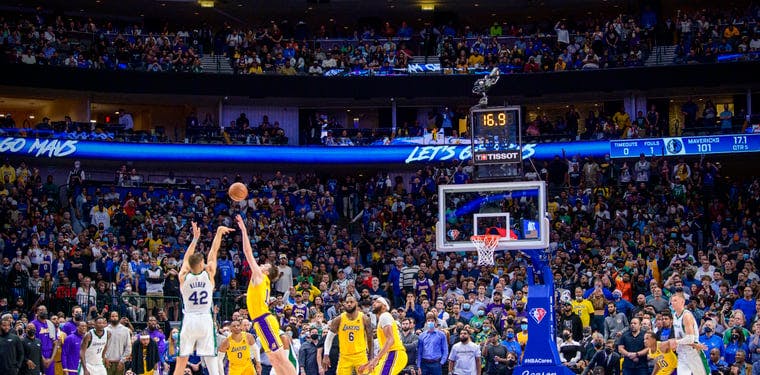 Maxi Kleber of the Dallas Mavericks sinks a game tying three against the Los Angeles Lakers in Overtime in Dallas during a December 2021 NBA Contest.