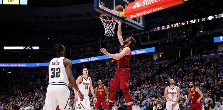 Cavaliers forward Kevin Love (0) lays the ball up in an October contest against the Denver Nuggets from Ball Arena in Denver