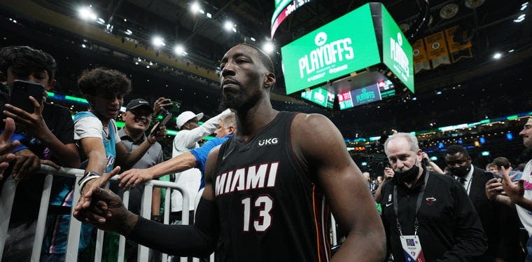 Heat center Bam Adebayo exits the court after defeating the Boston Celtics