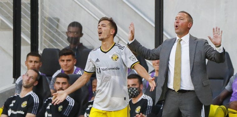 Columbus Crew head coach Caleb Porter yells from the sideline during a MLS match between the Columbus Crew and FC Cincinnati 
