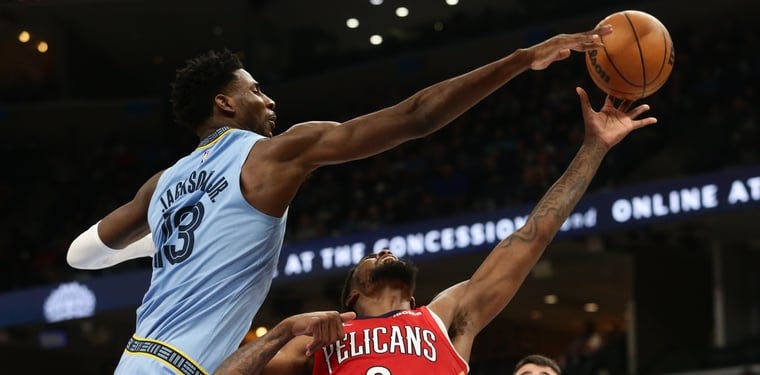 Memphis Grizzlies forward Jaren Jackson Jr. (13) blocks the shot of New Orleans Pelicans forward Naji Marshall (8) in a 2021-22 NBA matchup!