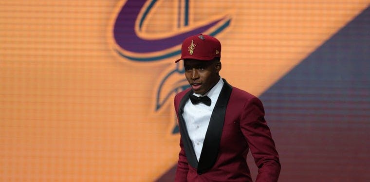 Collin Sexton walks off stage after being selected as the No. eight overall pick to the Cleveland Cavaliers